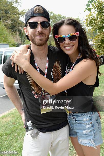 Jon Foster and Chelsea Tyler of Kaneholler pose backstage at the 2014 Budweiser Made In America Festival at Benjamin Franklin Parkway on August 30,...