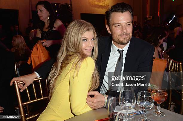 Musician Fergie and actor Josh Duhamel attend "TrevorLIVE LA" honoring Jane Lynch and Toyota for the Trevor Project at Hollywood Palladium on...