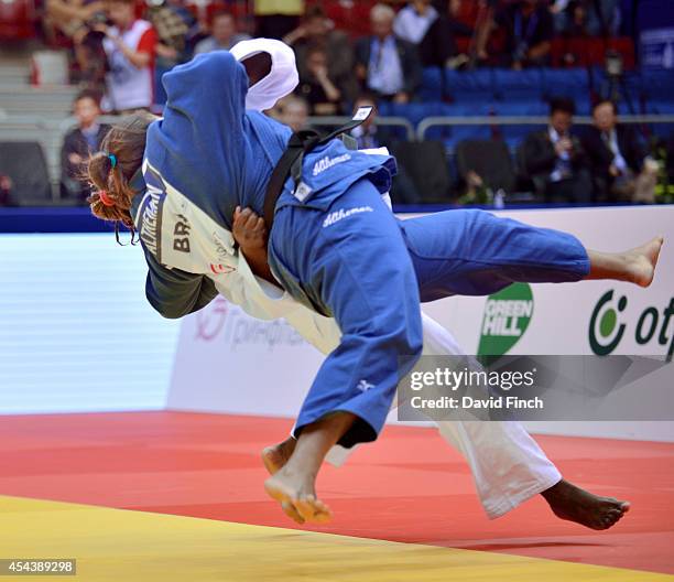 Olympic gold medallist, Idalys Ortiz of Cuba throws Maria Suelen Altheman of Brazil for ippon to win the o78kg gold medal during the Chelyabinsk Judo...