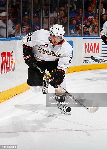 Mathieu Perreault of the Anaheim Ducks skates against the New York Islanders at Nassau Veterans Memorial Coliseum on December 21, 2013 in Uniondale,...