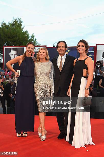 President of the Jury Alexandre Desplat , Dominique Lemonnier and their daughters attend the '3 Coeurs' premiere during the 71st Venice Film Festival...