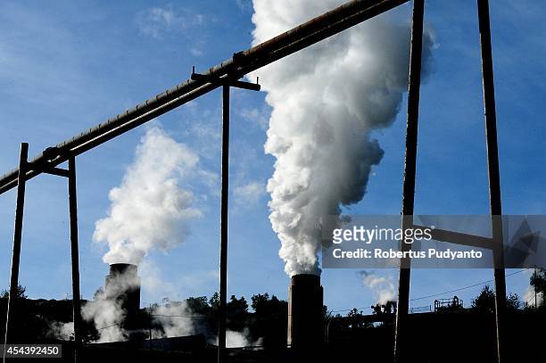 Steam power plan works in Dieng Plateau on August 30, 2014 in Dieng, Java, Indonesia. The Dieng Culture Festival is an annual event presenting a...