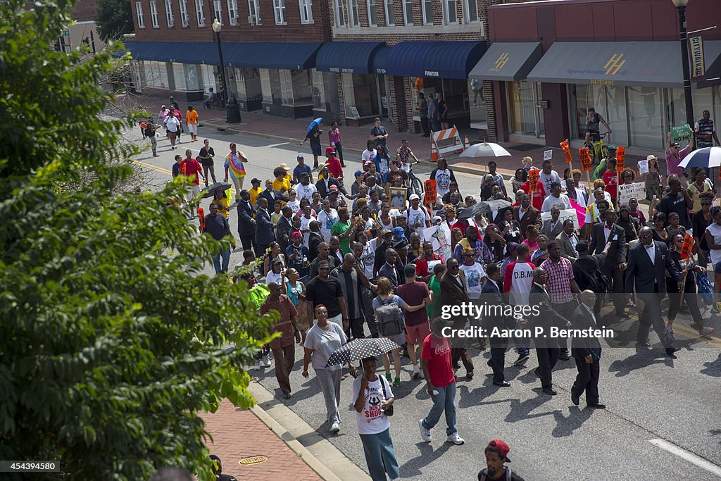 Rally Held in Ferguson Over Police Killing Of Michael Brown