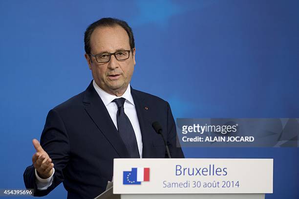French president Francois Hollande, holds a press meeting, as part of a European Union summit on August 31, 2014 at the EU Headquarters in Brussels....