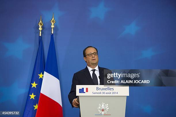 French president Francois Hollande, holds a press meeting, as part of a European Union summit on August 31, 2014 at the EU Headquarters in Brussels....