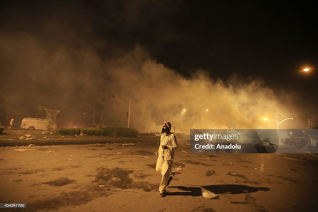 Clashes between security forces and anti-government protestors in Pakistan