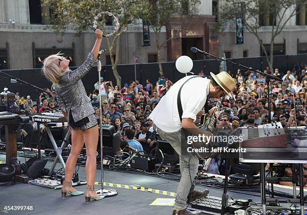 Recording artists Emily Haines and James Shaw of Metric perform on the Dylan Stage during day 1 of the 2014 Budweiser Made in America Festival at Los...