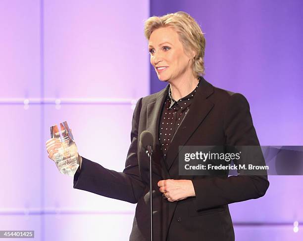 Honoree Jane Lynch accepts the Trevor Hero Award onstage at "TrevorLIVE LA" honoring Jane Lynch and Toyota for the Trevor Project at Hollywood...