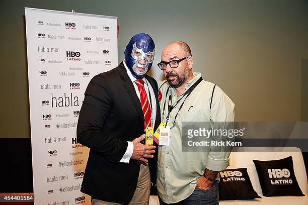 Luchador Blue Demon, Jr. And director Alberto Ferreras pose for a photograph during HBO Latino & Habla Men at People en Español San Antonio Festival...