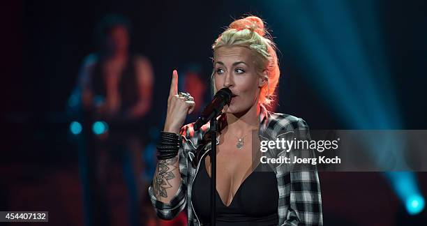 Singer Sarah Conner performs during the TV-Show 'Gabalier - Die Volks-Rock'n'Roll-Show' on August 30, 2014 in Fuessen, Germany.