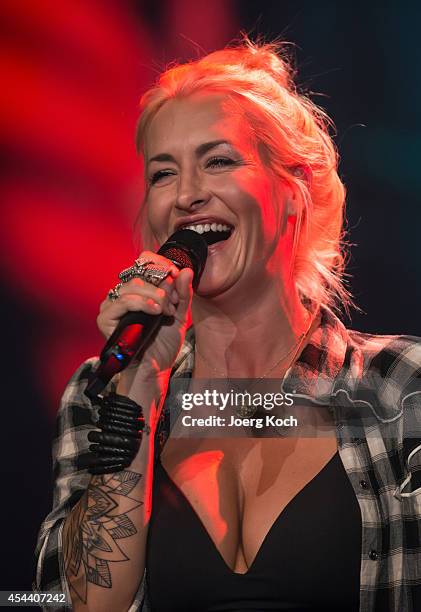 Singer Sarah Conner performs during the TV-Show 'Gabalier - Die Volks-Rock'n'Roll-Show' on August 30, 2014 in Fuessen, Germany.