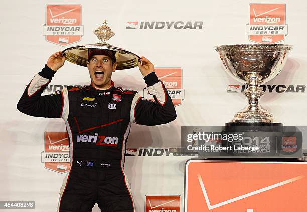Will Power of Australia driver of the Team Penske Dallara Chevrolet celebrates after winning the IndyCar Championship during the Verizon IndyCar...