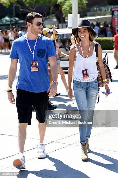 Actors Bryan Greenberg and Jamie Chung, wearing American Eagle Sky High Demin, attend American Eagle Outfitters Celebrates the Budweiser Made in...