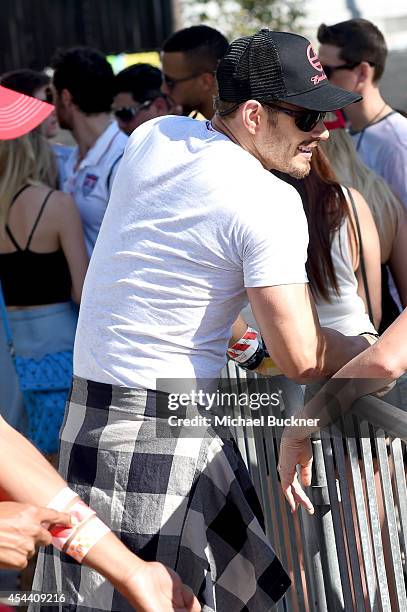 Actor Kellan Lutz, wearing an American Eagle plaid shirt, attends American Eagle Outfitters Celebrates the Budweiser Made in America Music Festival...