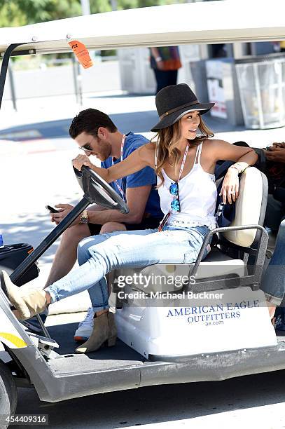 Actors Bryan Greenberg and Jamie Chung, wearing American Eagle Sky High Demin, attend American Eagle Outfitters Celebrates the Budweiser Made in...