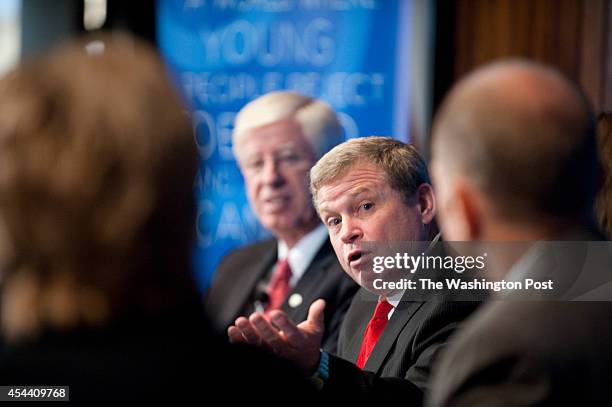 Legacy board member Tom Miller , left and Legacy's Chairman Larry Wasden , right, sit on a panel discussing the tobacco settlement 15 years ago, at...