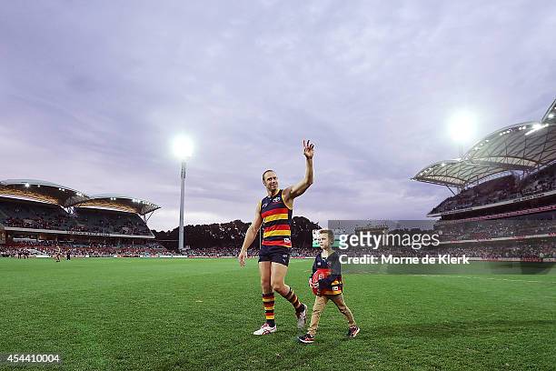 Ben Rutten of the Crows completes a lap after the round 23 AFL match between the Adelaide Crows and the St Kilda Saints at Adelaide Oval on August...