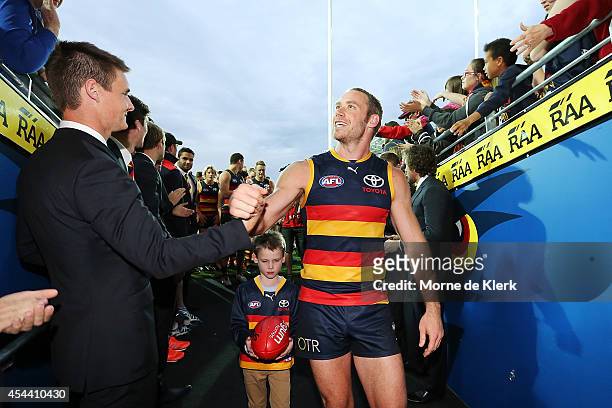 Ben Rutten of the Crows comes from the field after the round 23 AFL match between the Adelaide Crows and the St Kilda Saints at Adelaide Oval on...