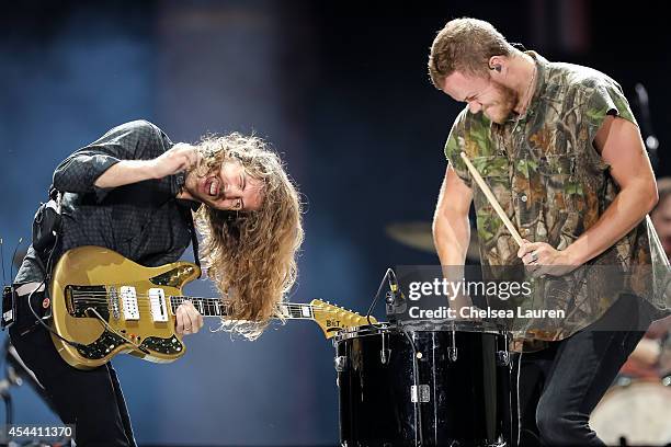 Guitarist Daniel Wayne Sermon and vocalist Dan Reynolds of Imagine Dragons perform during Day 1 of the Budweiser Made in America festival at Los...