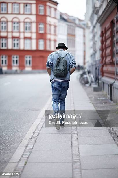 on his way - city sidewalk stock pictures, royalty-free photos & images