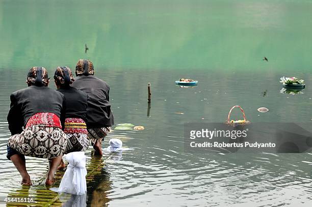 Dieng's religious leaders attend to the Larung ritual as part of Ruwatan Rambut Gimbal ceremony on August 31, 2014 in Dieng, Java, Indonesia. The...