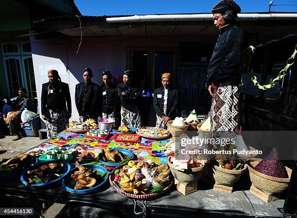 Dieng's religious leaders prepare the Ruwatan Rambut Gimbal offerings during Dieng Cultural Festival 2014 on August 31, 2014 in Dieng, Java,...