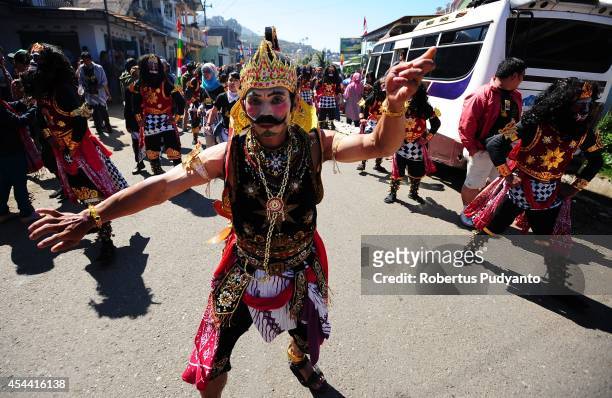 Traditional dancer performs during Ruwatan Rambut Gimbal parade on August 31, 2014 in Dieng, Java, Indonesia. The Dieng Culture Festival is an annual...