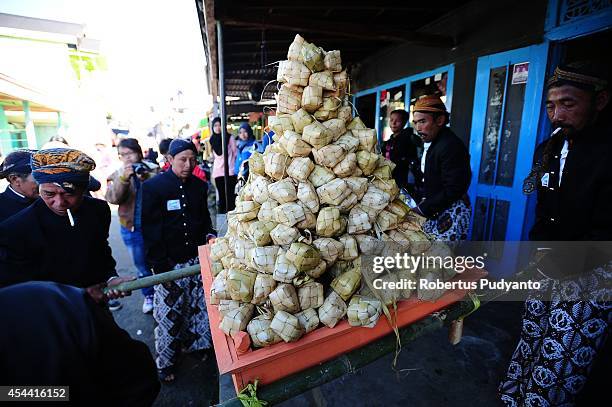 Dieng's religious leaders prepare the Ruwatan Rambut Gimbal offerings during Dieng Cultural Festival 2014 on August 31, 2014 in Dieng, Java,...