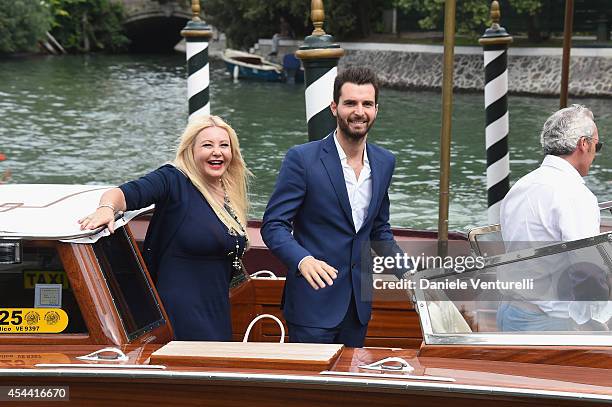 Monika Bacardi and Andrea Iervolino are seen during the 71st Venice International Film Festival on August 31, 2014 in Venice, Italy.