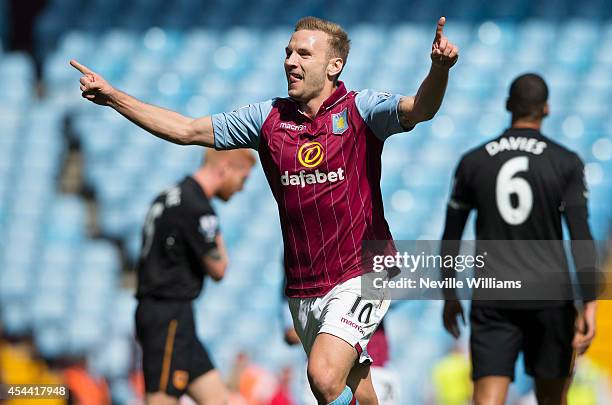 Andreas Weimann of Aston Villa celebrates his goal for Aston Villa during the Barclays Premier League match between Aston Villa and Hull City at...