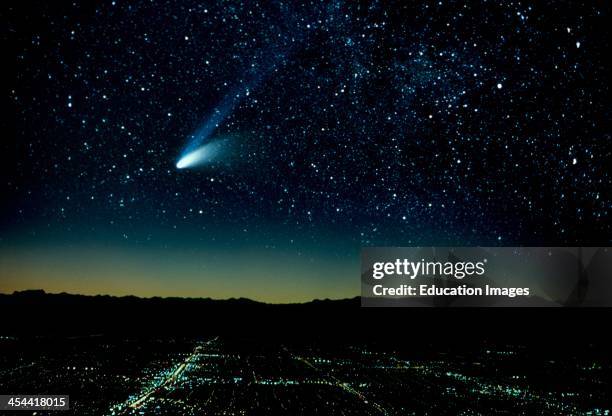 Hale-Bopp Comet And City At Night .
