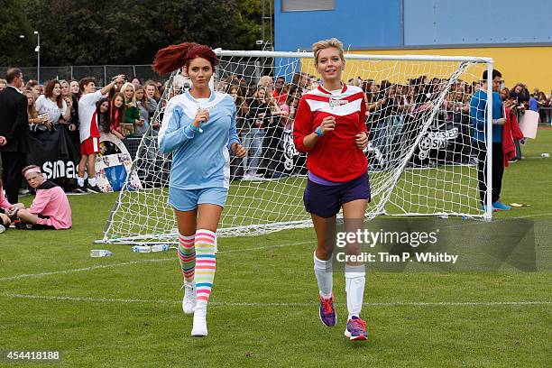 Amy Childs and Rachel Riley during the annual celebrity Soccer Six event at Mile End Stadium on August 31, 2014 in London, England.