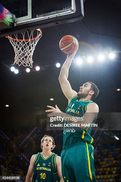 Australia's forward Cameron Bairstow looks at Australia's guard Adam Gibson during the 2014 FIBA World basketball championships group D match...