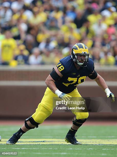 Erik Magnuson of the Michigan Wolverines looks to make the block during the second half of the game against the Appalachian State Mountaineers on...