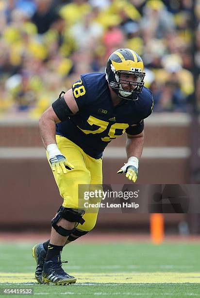 Erik Magnuson of the Michigan Wolverines looks to make the block during the second half of the game against the Appalachian State Mountaineers on...