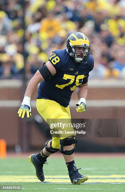 Erik Magnuson of the Michigan Wolverines looks to make the block during the second half of the game against the Appalachian State Mountaineers on...