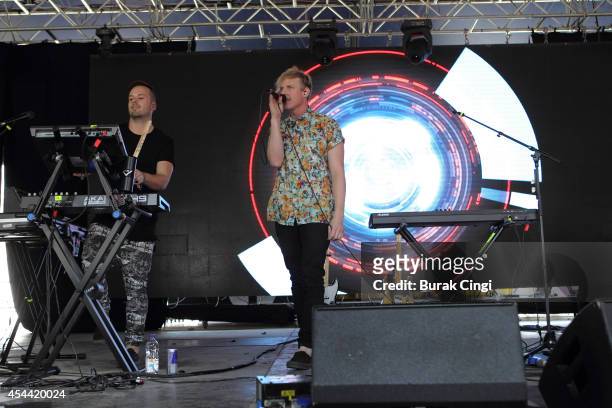 Jon George and Tyrone Lindqvist of Rufus perform on stage at Reading Festival at Richfield Avenue on August 22, 2014 in Reading, United Kingdom.