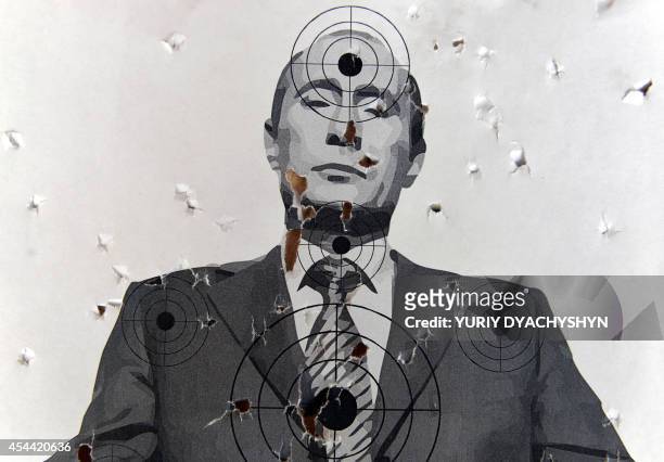 Target depicting a portrait of Russian President Vladimir Putin, in a shooting range in the center of the western Ukrainian city of Lviv, on August...