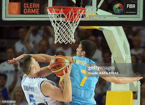 Finland's forward Erik Murphy vies with Ukraine's guard Sviatoslav Mykhailiuk during the 2014 FIBA World basketball championships group C match...