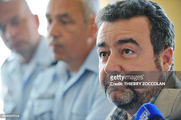 French prosecutor Sebastien Farges gives a press conference on August 31, 2014 in Gueret, after the body of a four-month-old baby was found, after it...