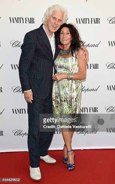 Douglas Kirkland and Francoise Kirkland attend the Chopard And Vanity Fair Present 'Backstage At Cinecitta' Exhibition - Red Carpet - 71st Venice...
