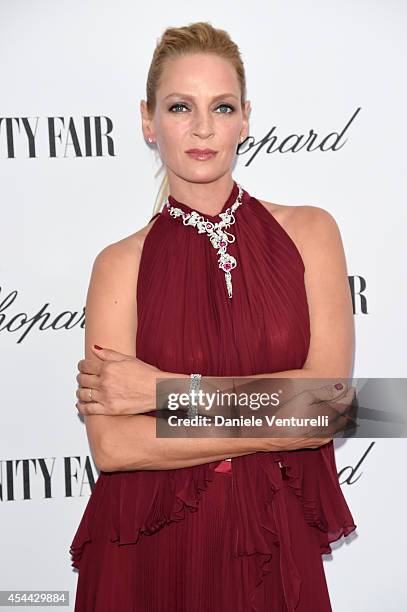 Uma Thurman attends the Chopard And Vanity Fair Present 'Backstage At Cinecitta' Exhibition - Red Carpet - 71st Venice Film Festival at Cipriani...