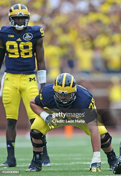 Erik Magnuson of the Michigan Wolverines looks to make the block during the second half of the game against the Appalachian State Mountaineers on...