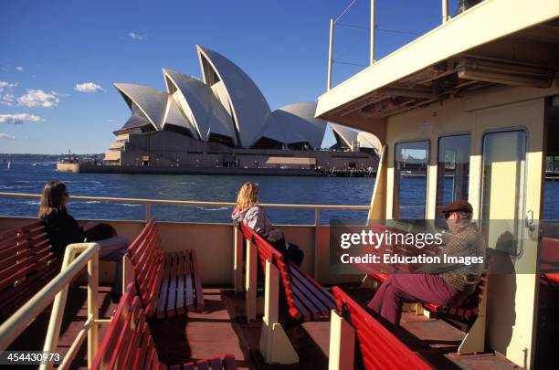 Australia, Sydney Harbor Ferry With Opera House In Background.