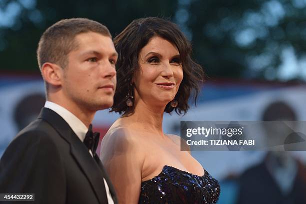 Actress Alessandra Martines arrives with actor Cyril Descours for the screening of the movie "Hungry Hearts" presented in competition at the 71st...