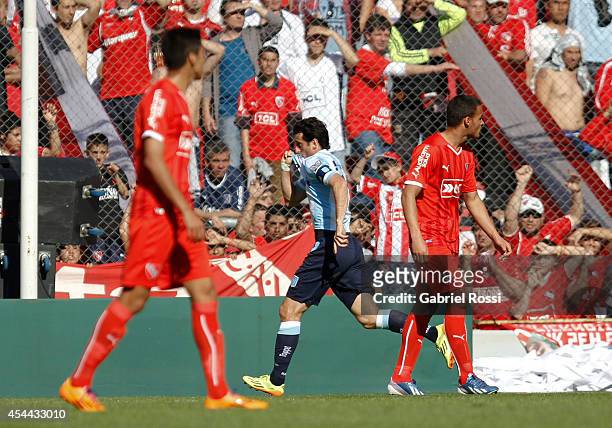 Diego Milito of Racing Club celebrates after scoring the opening goal against Independiente during a match between Independiente and Racing as part...