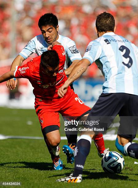 Rodrigo Gomez of Independiente in action during a match between Independiente and Racing as part of fifth round of Torneo de Transicion 2014 at...