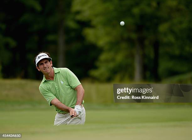 Gonzalo Fernandez-Castano of Spain takes his third shot on the 15th hole during the third round of the Deutsche Bank Championship at the TPC Boston...