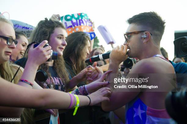 Tom Parker of The Wanted performs onstage during day 2 of Fusion Festival 2014 on August 31, 2014 in Birmingham, England.