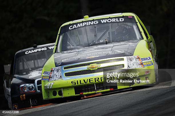 Ray Courtemanche Jr., driver of the La Cite de Mirabel Chevrolet, during the NASCAR Camping World Truck Series Chevrolet Silverado 250 on August 31,...